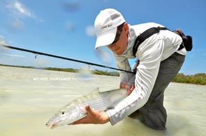 Sean Visintainer releasing his largest Bonefish of the trip. This bone was actually one of the fish caught in the double with his brother.