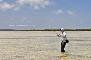 Sean dressed like a flats ninja casting to Bonefish.