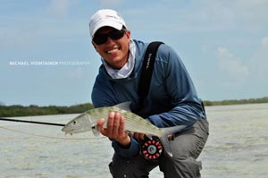 Sean Visintainer posing with an average Bonefish in the Bahamas... oh darn huh?