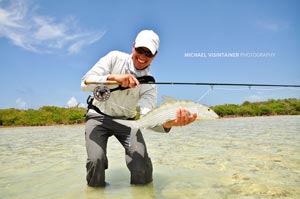 Sean holding another good average 2 pound Bonefish. This was one of many fish that day.