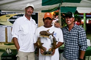 Team Fly Treks (Doug Brady, Parnel Coc, and Sean) pose with their 2nd place trophy... if Sean didn't loose one of his bonefish they would have taken 1st.