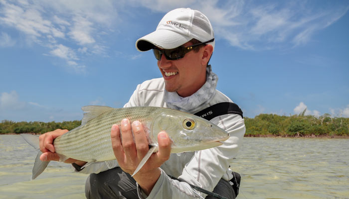 Sean holding up a nice Long Island, Bahamas Bonefish.