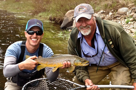 Sean Visintainer holding a Big Hole Brown Trout.