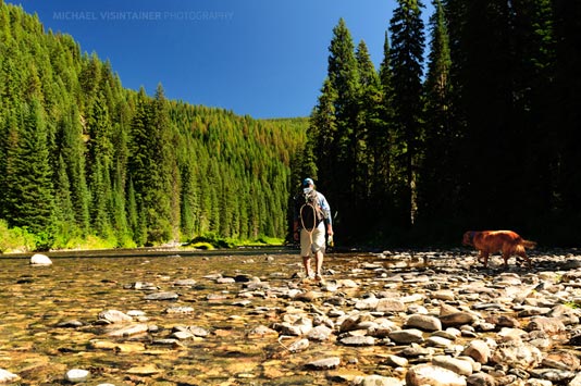 Sean and his dog Eddy hiking up the Upper St Joe River in Idaho.