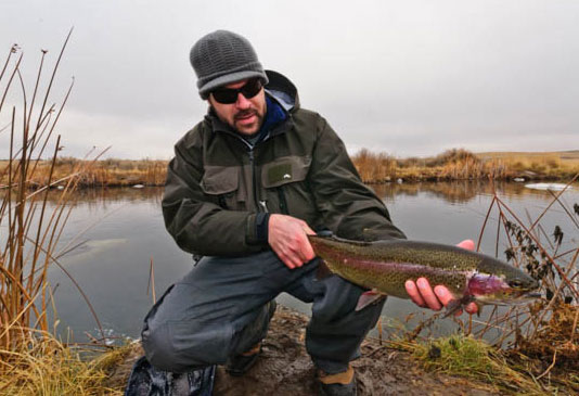 Mark Poirier with a nice trout at Rocky Ford Creek.
