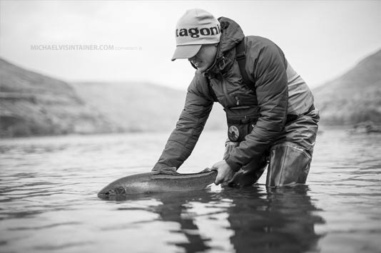 Sean Visintainer with Snake River Steelhead Fish.