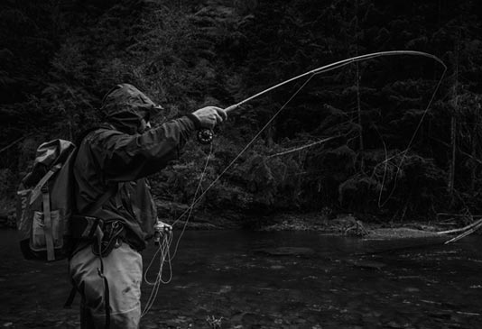 Fly Fishing North Idaho Streams during rainy weather for trout.