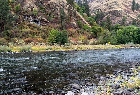 Slots between boulders provide slightly deeper refuge for traveling fish. Find the slot, find the fish.