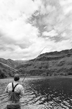 Spencer fighing his first steelhead on the swing.