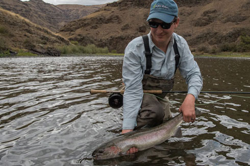 Spencer swinging up his first Steelhead on his Winston Spey Rod.