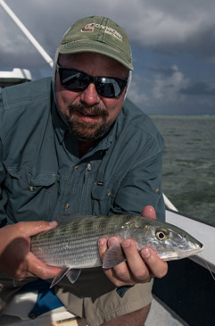 Sam Wood with a good bonefish before the rain storm. 