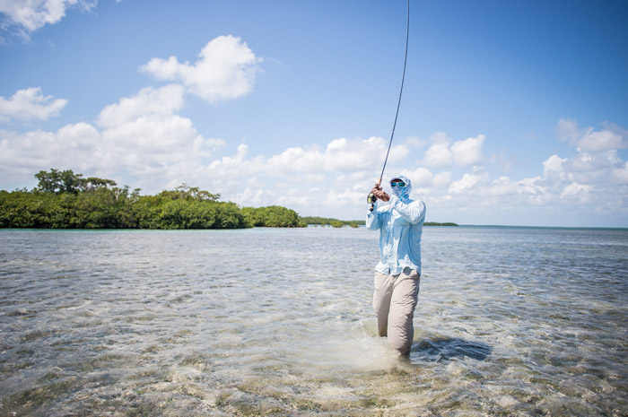 Belize guide Mark Hyde from Turneffe Flats Lodge Hooked up on bonefish along the reef. 