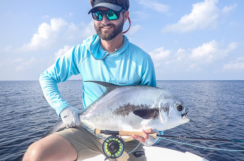 Rob Glazier with his first permit at Turneffe Flats Lodge Belize on the Scott Tidal. 