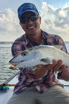 Sean Visintainer, owner Silver Bow Fly Shop, with a quality bonefish at Turneffe Flats Belize.