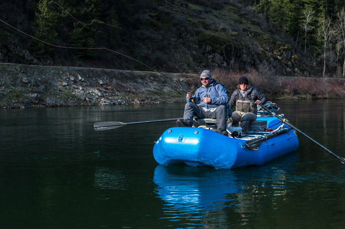 Shop employee Bo Brand floating down the St. Joe River, Idaho.