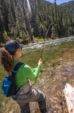 Jennifer fly fishing North Idaho.