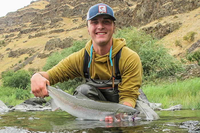 Silver Bow guide Kenyon Pitts with a beautiful Grande Ronde Steelhead caught on his spey rod.