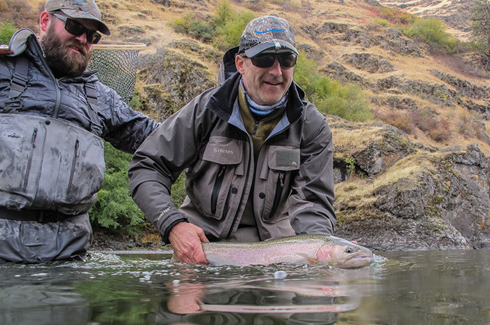 Silver Bow guide Bjorn Ostby with a beautiful Grande Ronde Steelhead.
