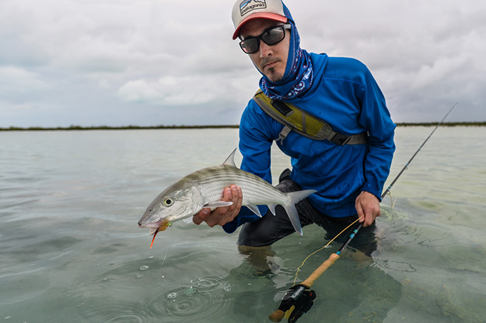 Mike with a quality Acklins bonefish on a cloudy evening. 