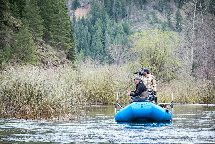 Bo Brand and Joe Amend target risers on the St. Joe River, Idaho while Michael Visintainer patiently tries to get the perfect shot.