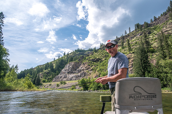 Fly fishing the St. Joe River in Idaho for cutthroat trout on dry flies in an Adipose Flow Skiff.