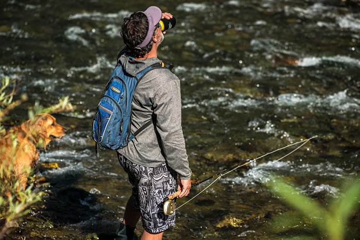 Taking a beer break while wet wading and fishing the Scott G Series fly rod.