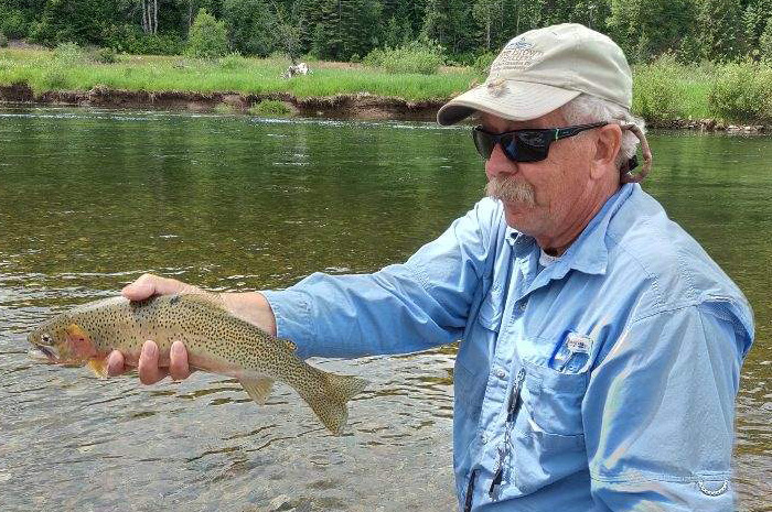 Idaho fly fishing guide Bill Johnson with a nice St. Joe River cutthroat trout.