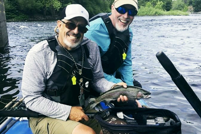 Spokane Fly Fishing Guide Jake Hood with a nice Spokane River Redband trout.