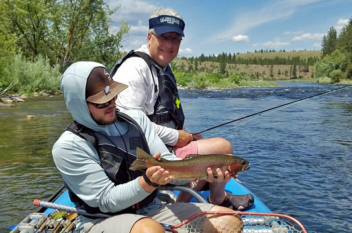 A tanker Redband Rainbow trout caught on the Spokane River while on a guided fishing trip.