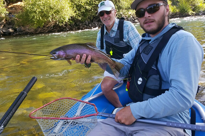 Kenyon Pitts, Spokane River Fly Fishing Guide, with a solid Spokane River trout.