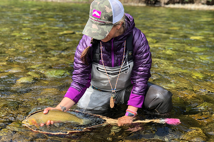 Heather Hodson releasing a beautiful cutthroat from the North Fork Clearwater