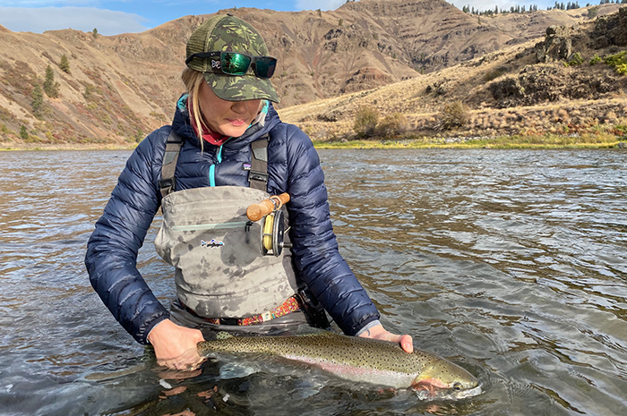 Jenny O'Brien with a beautiful Grande Ronde steelhead swung on a spey rod. Photo Credit: Heather Hodson