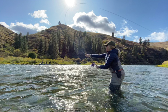 Jenny O'Brien sending out a spey cast on the Grande Ronde River, Washington State. Photo Credit:Heather Hodson