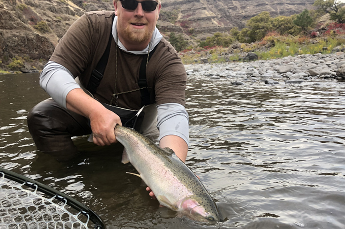 Nate Bell and a tanker Grande Ronde steelhead.