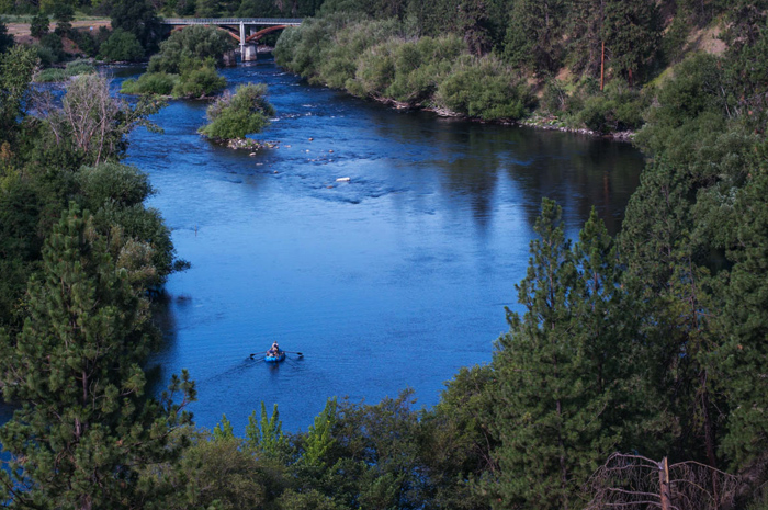 Spokane River fly fishing guide Britten Jay drifts the river with anglers.