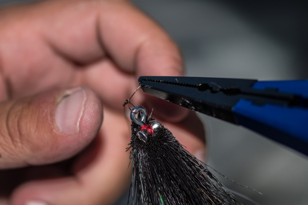 Tightening the bite wire before casting to golden dorado.