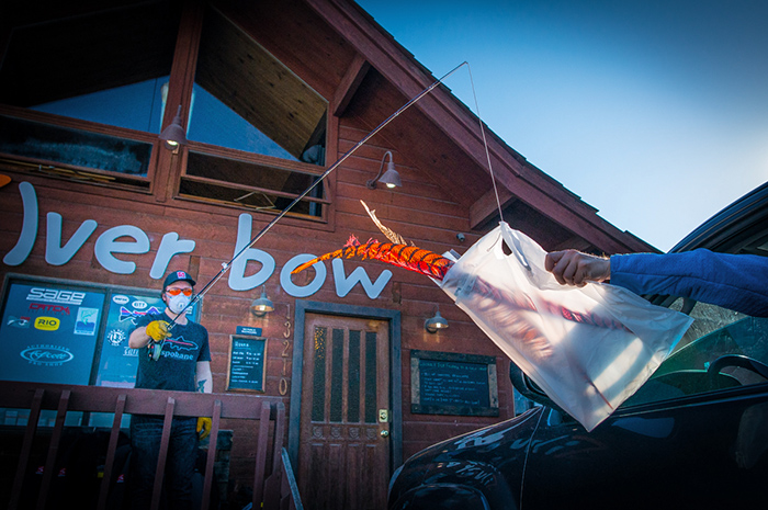 Kenyon Pitts delivering fly tying goods to go at the Silver Bow Fly Shop in Spokane, Washington