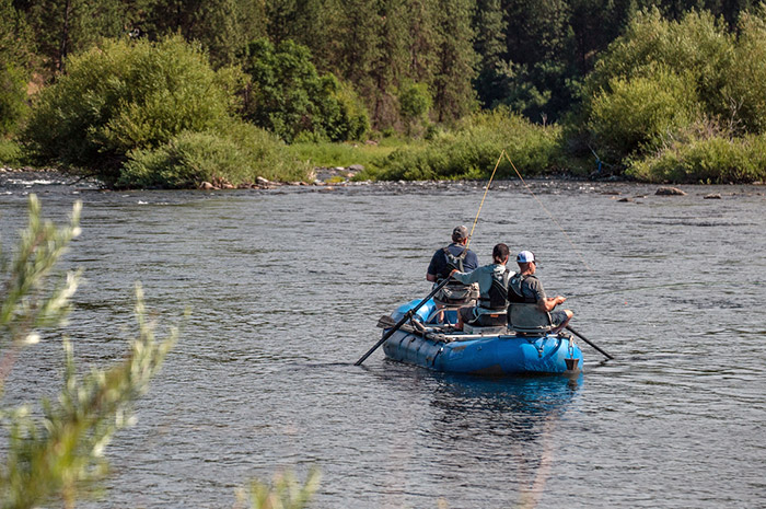 Spokane River guide Kenyon Pitts drifts along with anglers (summer 2019 photo). 