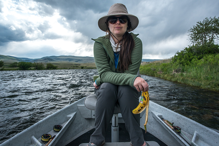 Jennifer Nepean defying angling superstition and eating a banana on the boat.