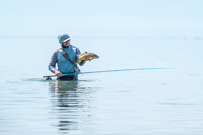 Kenyon Pitts fly fishing for carp in eastern Washington.