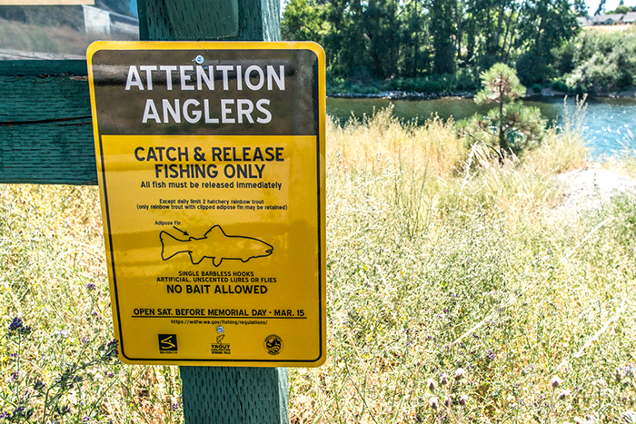 Spokane River fishing regulations sign informing anglers of the special rules and season in place on the Spokane River.