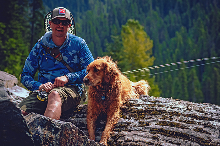 Sean Visintainer, owner Silver Bow Fly Shop, with his brother Michael's trusty shop / fishing dog Graham. Photo Credit: Michael Visintainer.