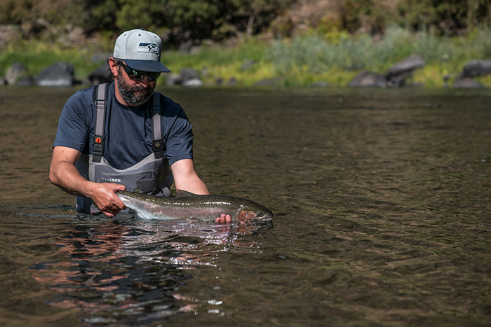 Bo Brand with a solid Grande River River steelhead.