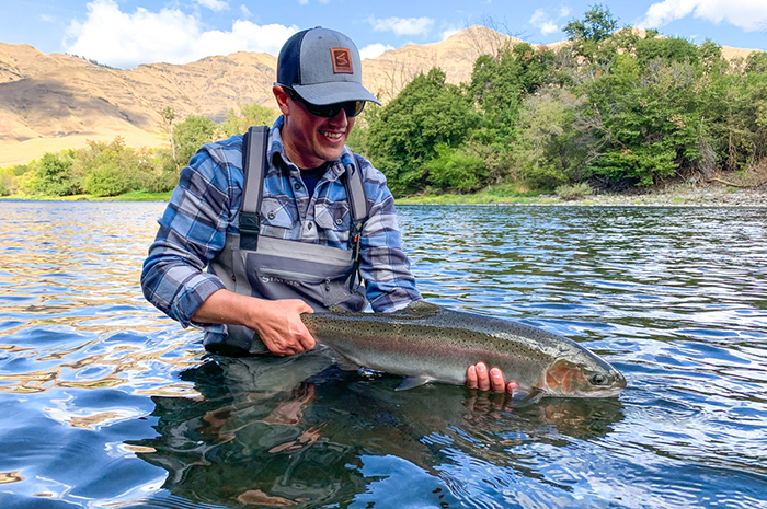 Sean Visintainer with a native hen steelhead from the Grande Ronde River.