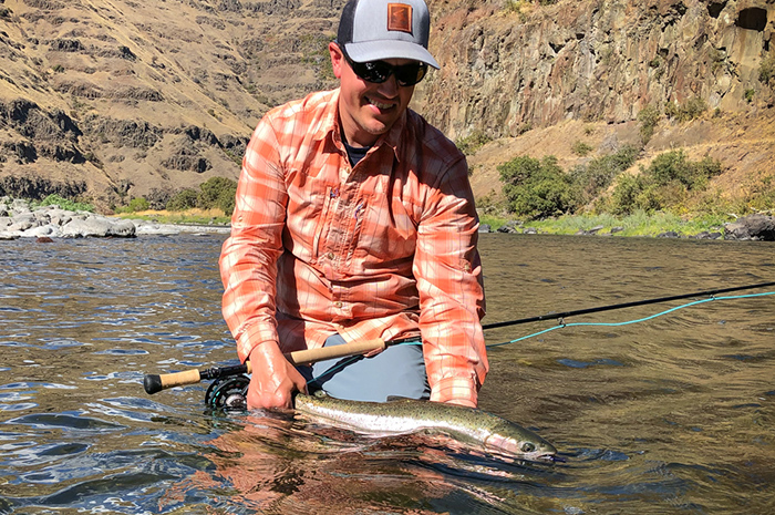 Sean Visintainer with a swung Grande Ronde steelhead.