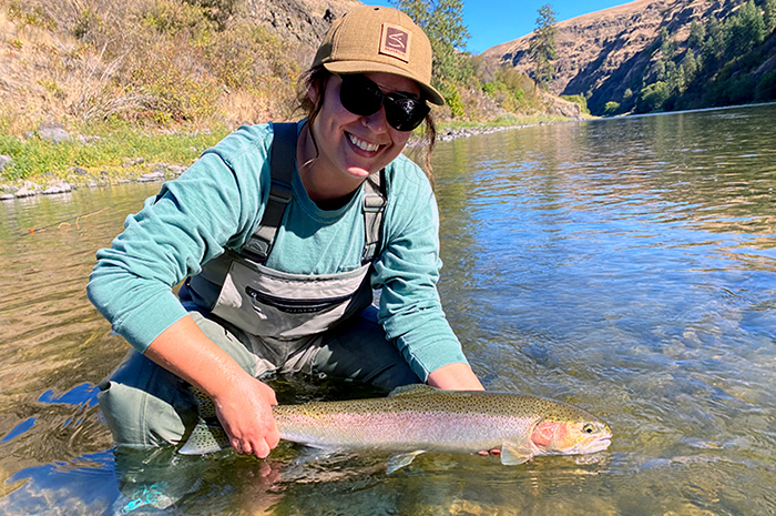 Mikayla Zivic with Grande Ronde Steelhead. Photo Credit Silver Bow Guide Kenyon Pitts