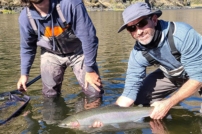 Silver Bow Guide Kenyon Pitts with a bright, wild Grande Ronde steelhead and happy guest.