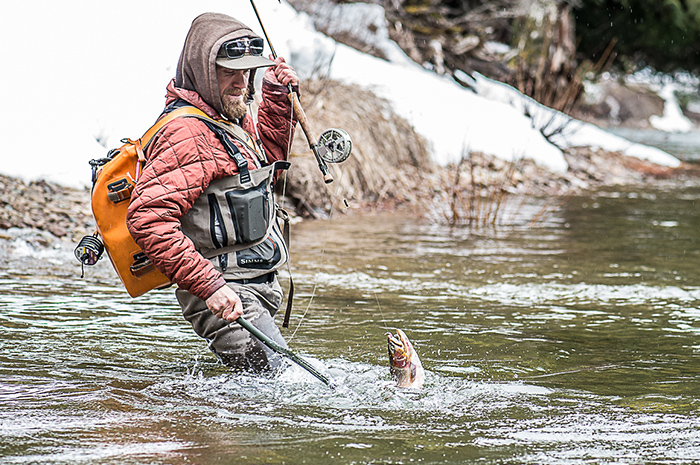 Jesse Retan fly fishing for cutthroat on the North Fork of the Coeur d'Alene River, Idaho.