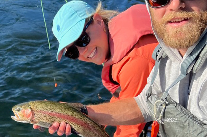 Silver Bow fishing guide Jesse Retan with a happy guest and a nice Spokane River Redband trout.