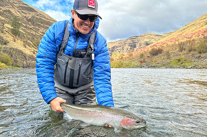 Kenyon releasing a Grande Ronde steelhead on a fine fall day.